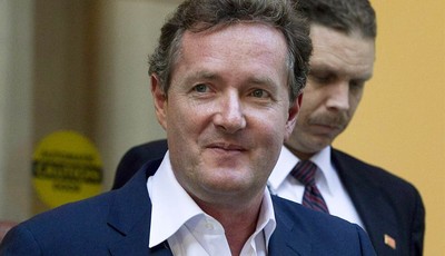 
              FILE - In this Dec. 20, 2011 file photo, Piers Morgan, host of CNN
